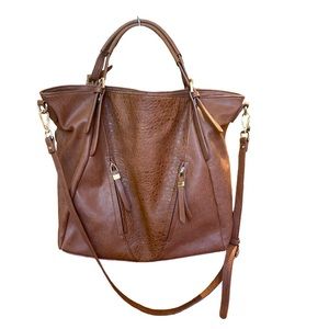 Brown faux leather large bucket bag in dark caramel